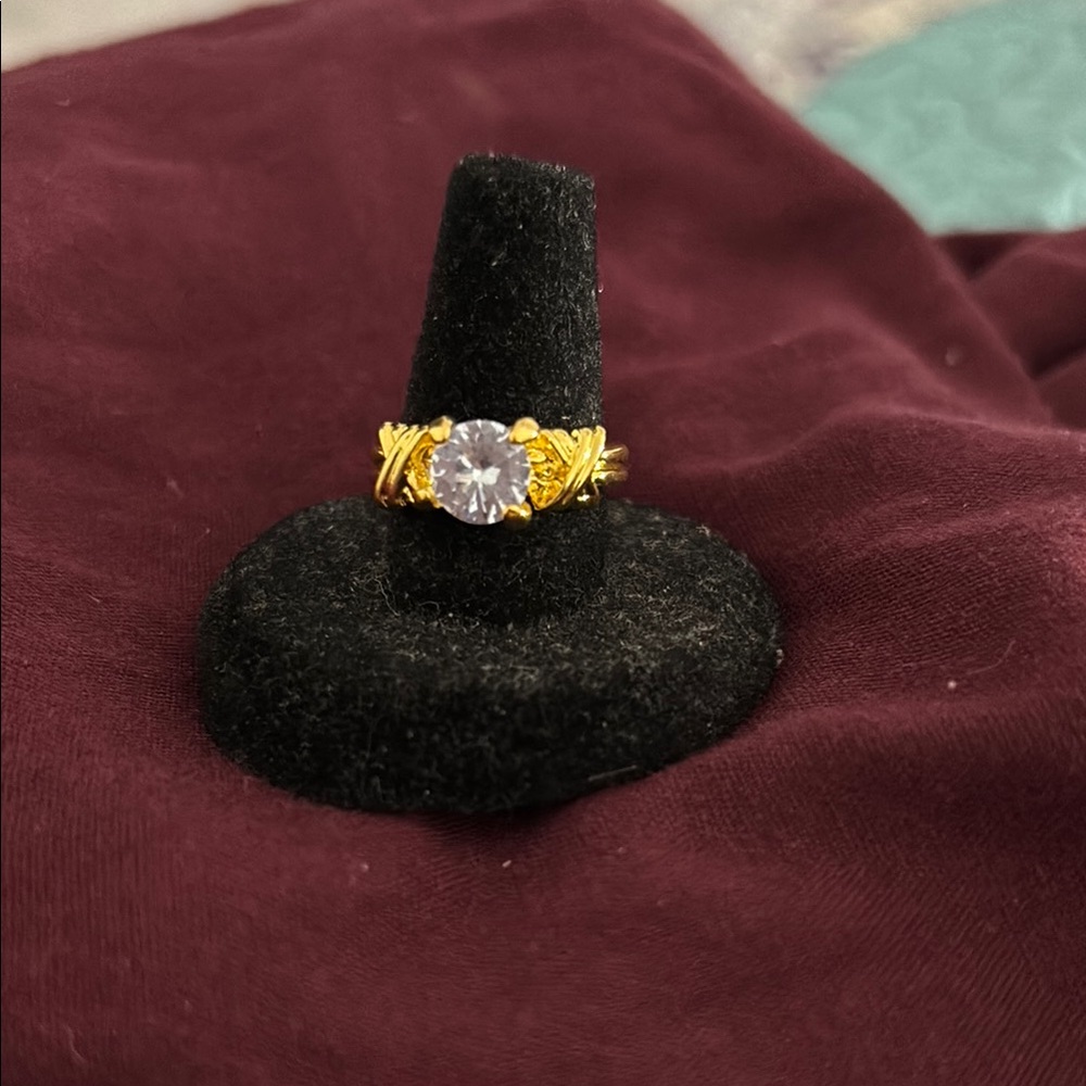 Elegant Gold Ring with Clear Stone